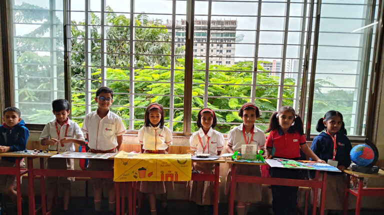 Students presenting projects to parents at Radcliffe Dighi